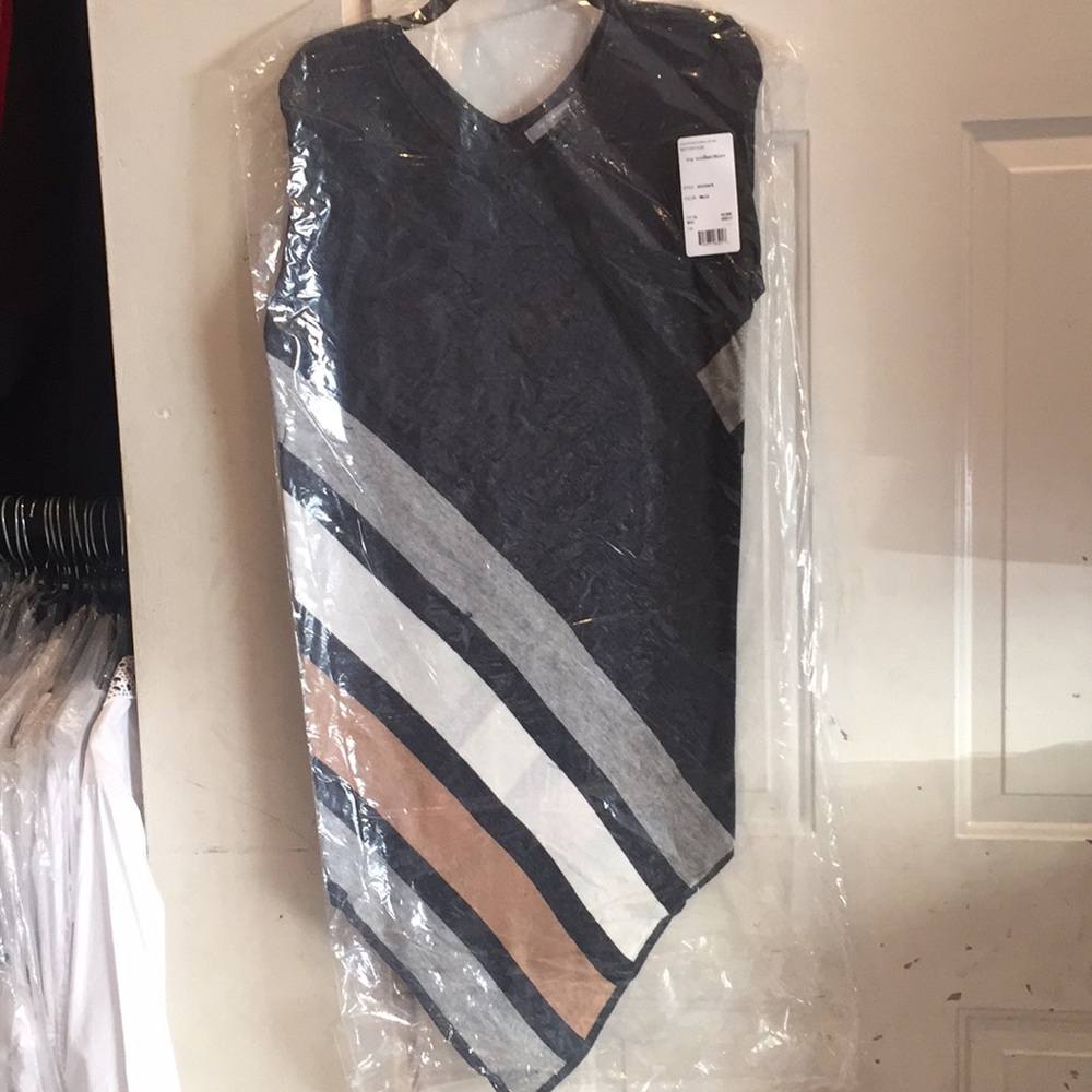 A brand new Poncho( different sizes! )